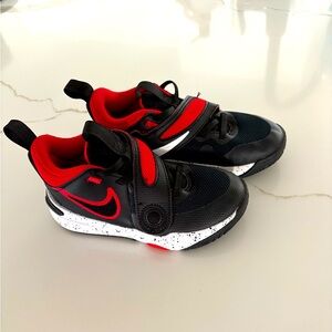 Nike 
Only worn inside for a few basketball games 
Size kids 11
Red and black